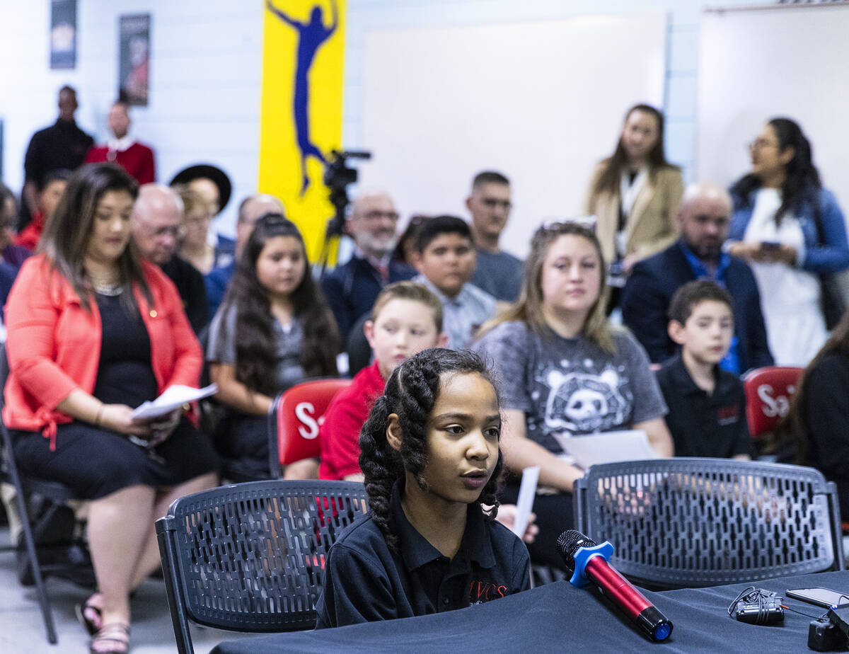 Eden Johnson, a third-grade student at Mountain View Christian School, delivers her testimony d ...