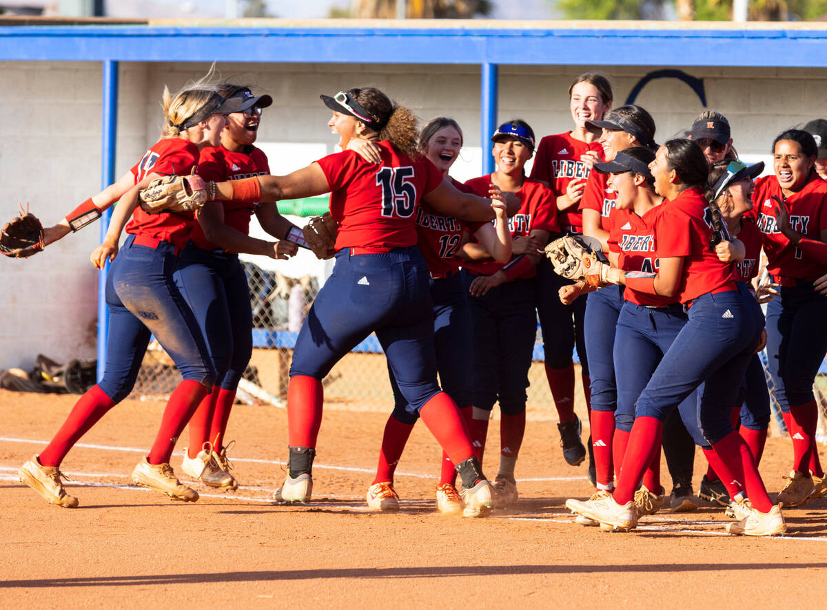 Liberty High School players celebrate their 4-3 win against Green Valley High during the NIAA 5 ...