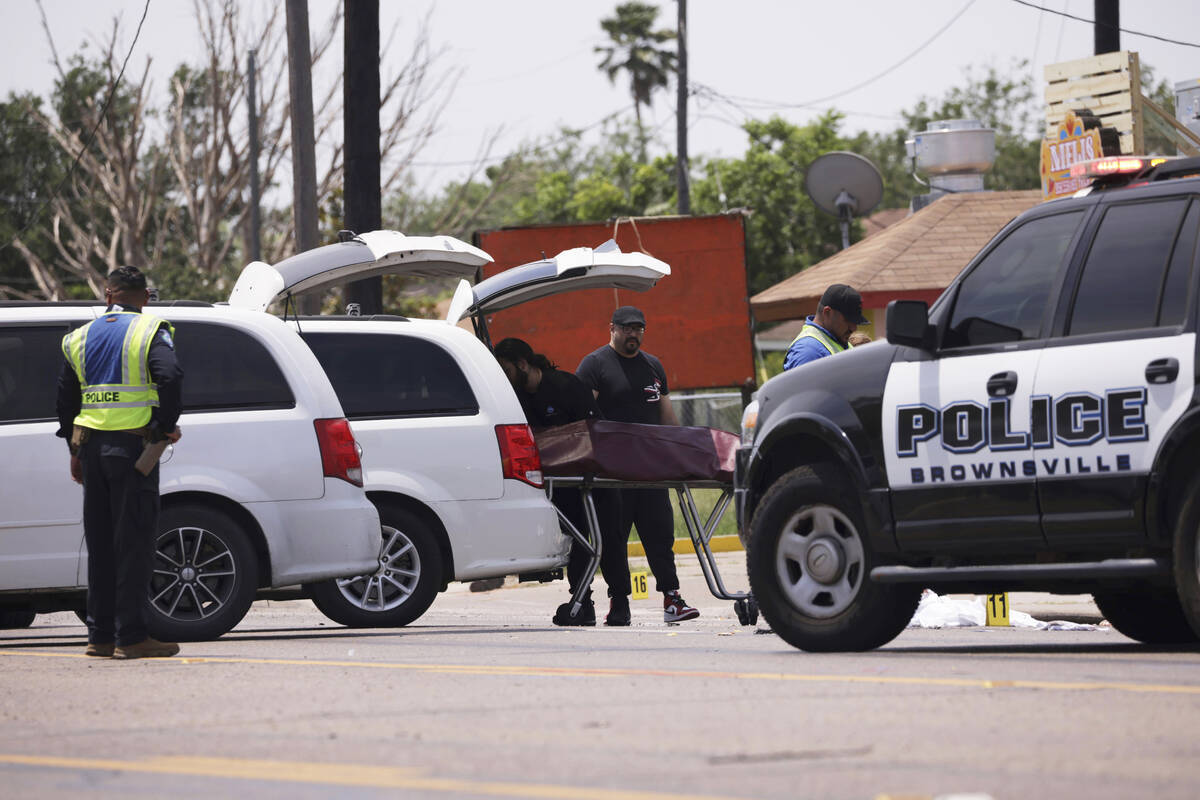 Emergency personnel respond to a fatal collision in Brownsville, Texas, on Sunday, May 7, 2023. ...