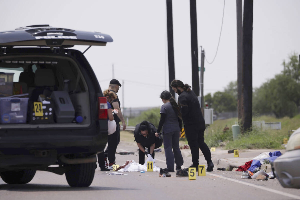 Emergency personnel respond to a fatal collision in Brownsville, Texas, on Sunday, May 7, 2023. ...