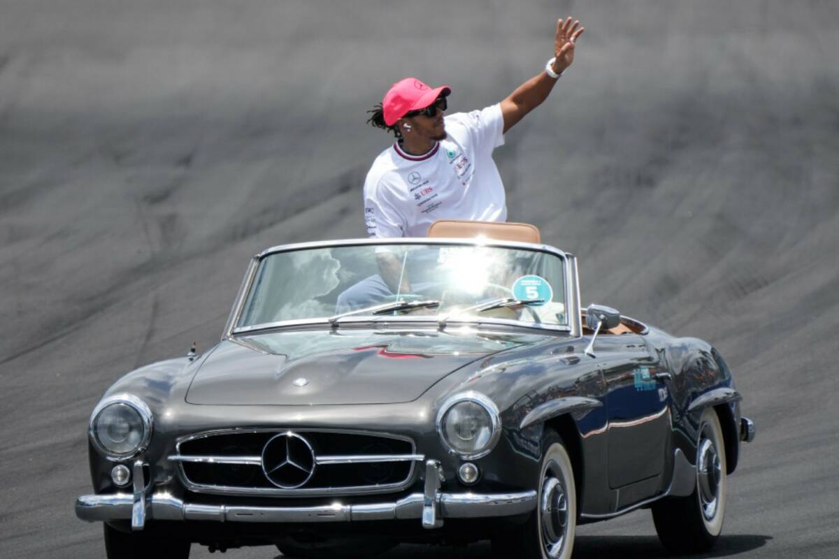 Mercedes driver Lewis Hamilton (44) of Team Great Britain waves to the crowd during the drivers ...