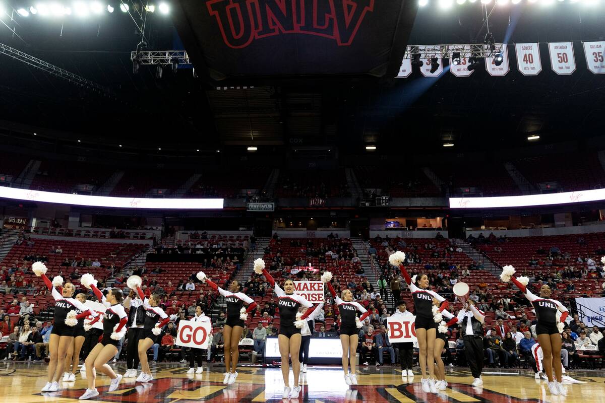 The Rebel Girls & Company perform during a timeout of a UNLV basketball game at the Thomas ...