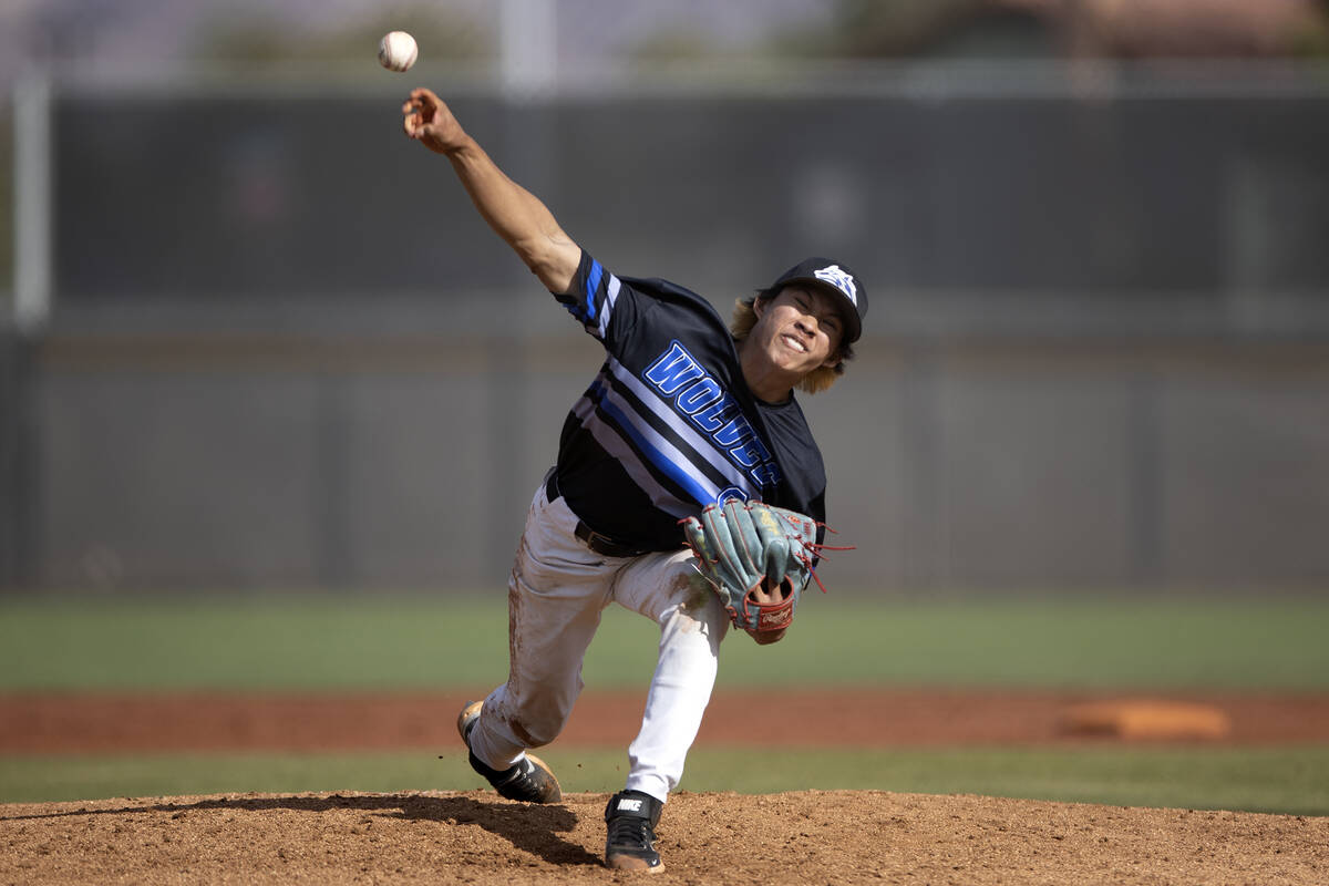 Basic pitcher Tee Southisene throws to Coronado during a high school Class 5A Southern Region p ...