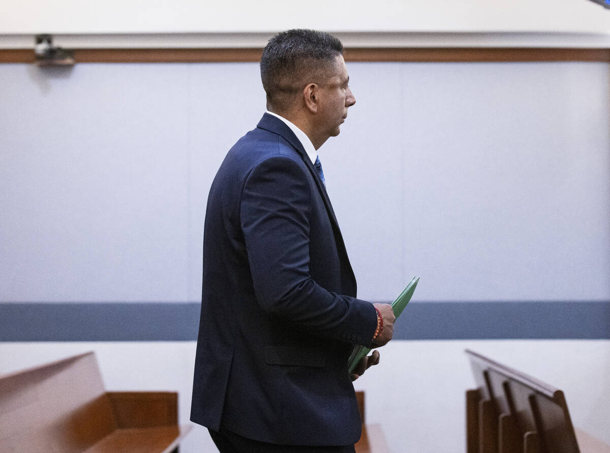 Former Alpine Motel Apartments owner Adolfo Orozco arrives in the courtroom during a preliminar ...
