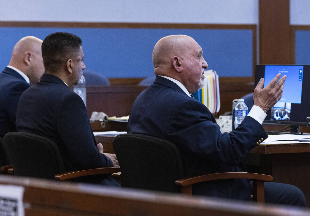 Attorney Dominic Gentile, right, representing former Alpine Motel Apartments owner Adolfo Orozc ...