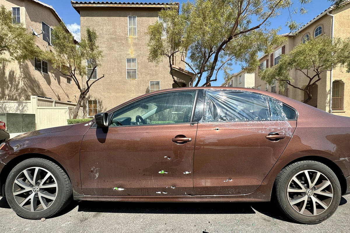A brown Volkswagen Jetta SE with what appeared to be nine bullet holes was parked on Camille Cr ...