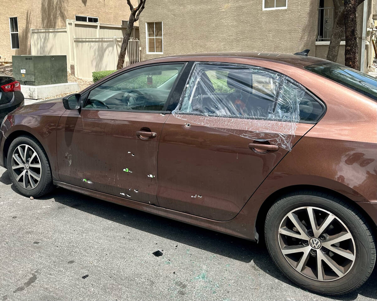 A brown Volkswagen Jetta SE with what appeared to be nine bullet holes was parked on Camille Cr ...