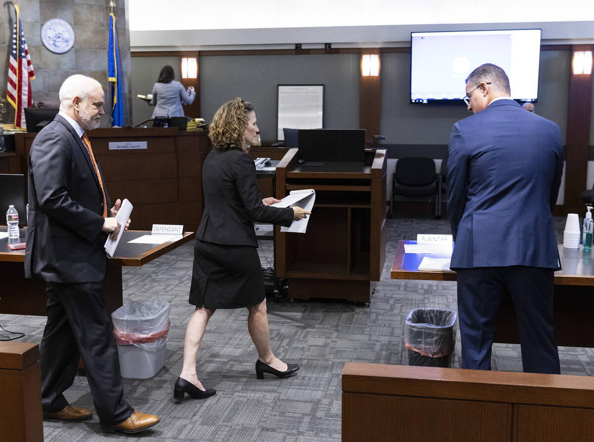 Joel Tasca, left, and Ashley Kissinger, attorneys representing the Las Vegas Review-Journal, pr ...