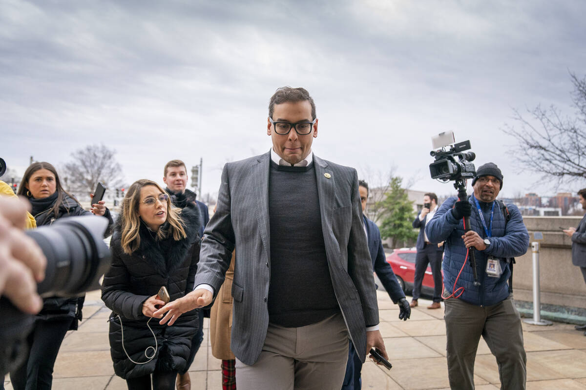 FILE - Rep. George Santos, R-N.Y., leaves a House GOP conference meeting on Capitol Hill in Was ...