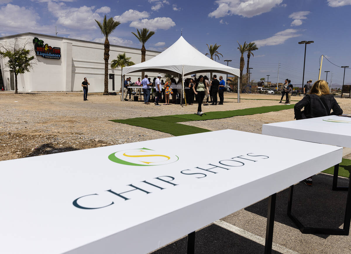People gathered on Wednesday, May 10, 2023 at the site where Chip Shots, a private club featuri ...