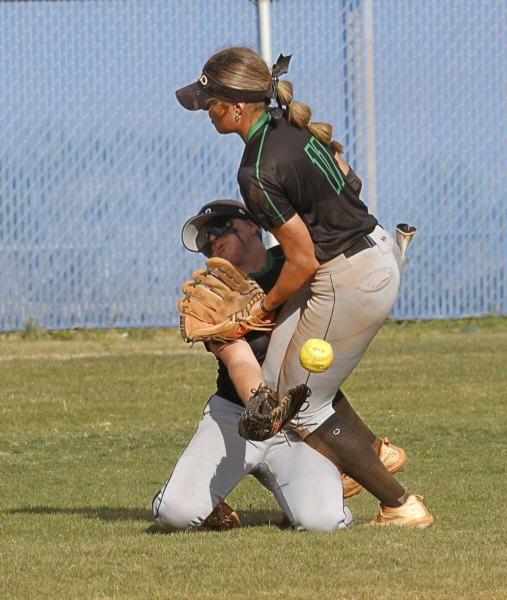 Palo Verde's Belle Will (6), left, collides with Palo Verde's Taylor Johns (11) as she tries to ...