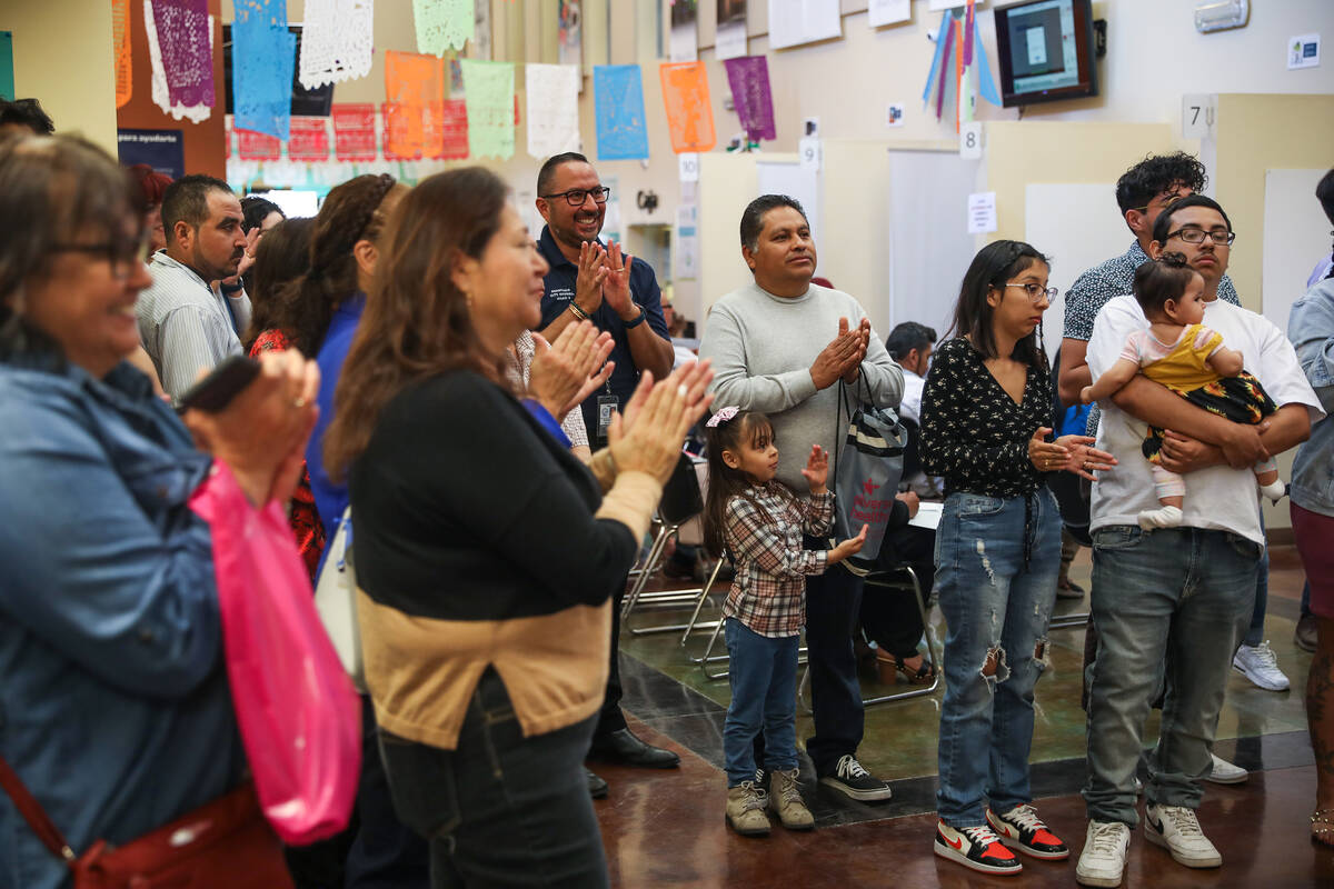 The crowd applauds at an event to celebrate Mexican Mother’s Day at the Consulate of Mex ...