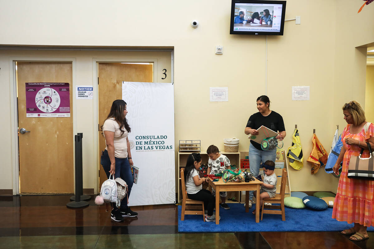 Families and their children in the newly donated children’s area at the Consulate of Mex ...