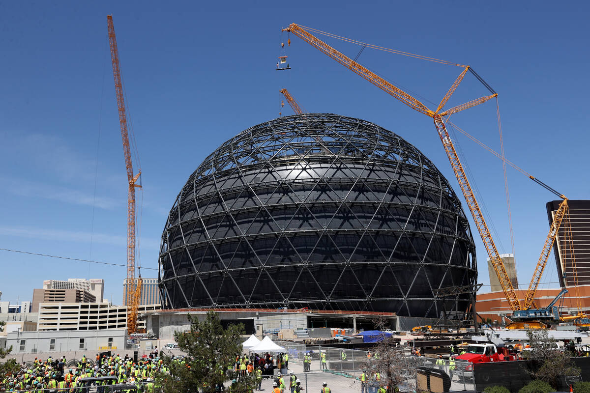 The final beam is placed at the top of the MSG Sphere at The Venetian during a topping-out cere ...