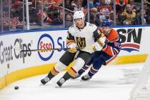 Vegas Golden Knights Jack Eichel (9) is chased by Edmonton Oilers' Connor McDavid (97) during t ...