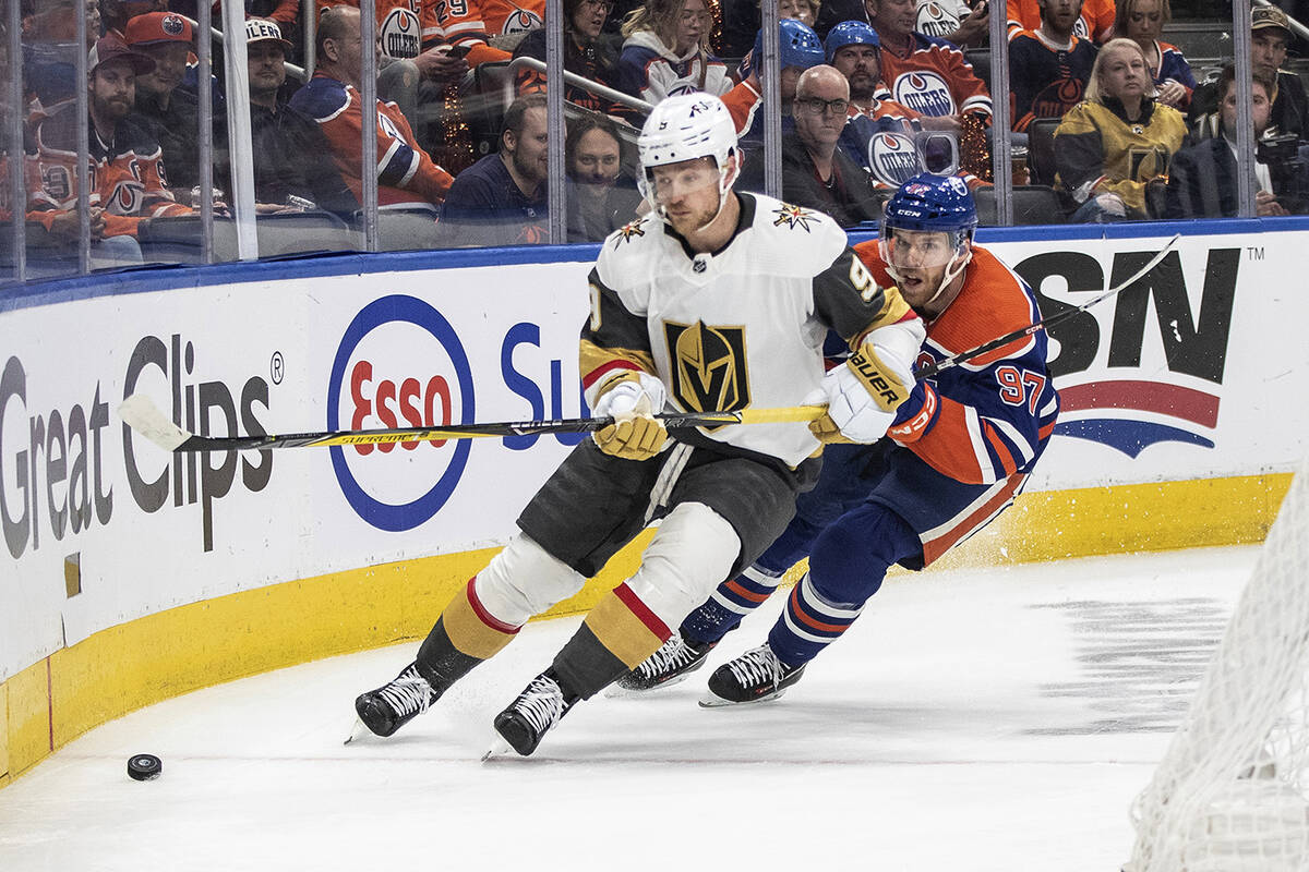 Vegas Golden Knights Jack Eichel (9) is chased by Edmonton Oilers' Connor McDavid (97) during t ...