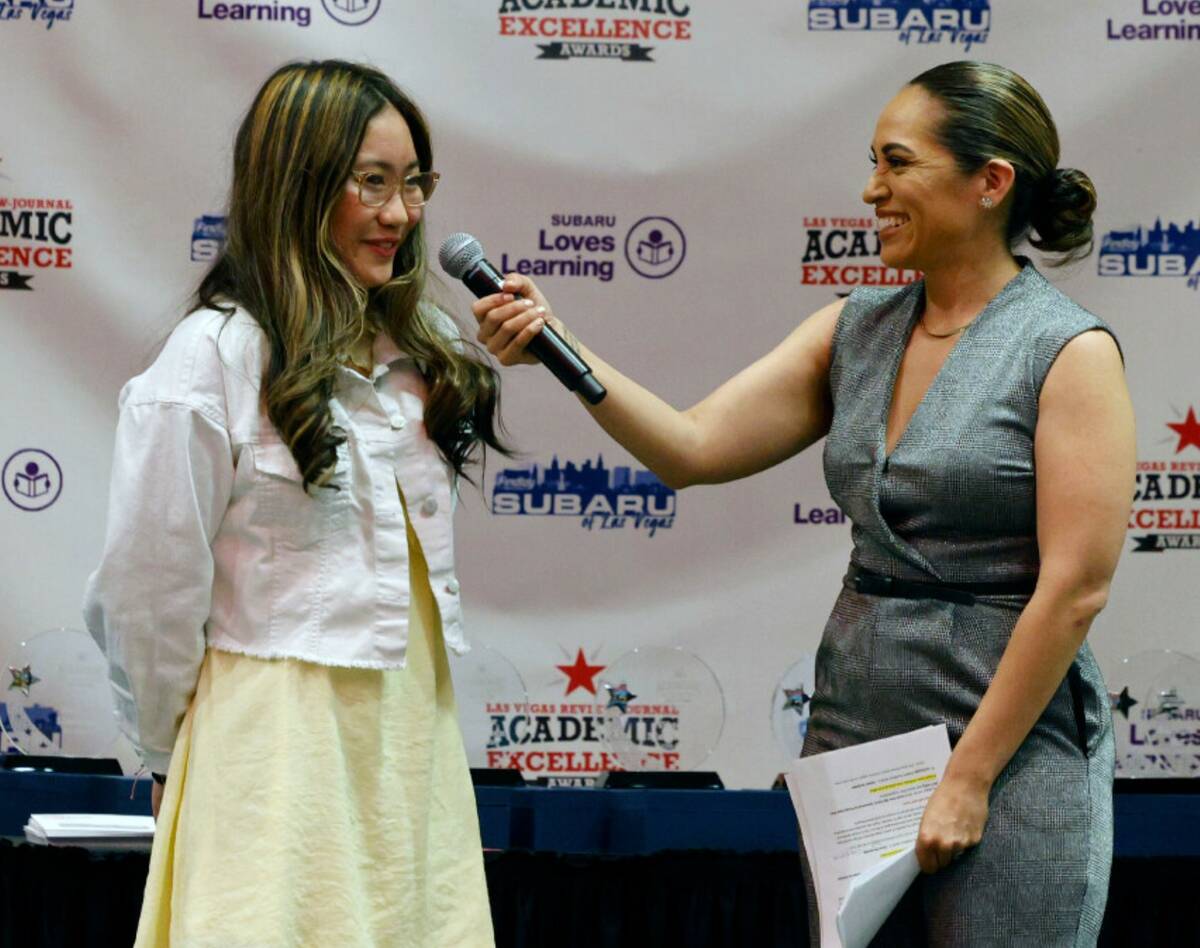 Kamilla Hu, seventh grader of Bob Miller Middle School, speaks to Carrie Roper, Las Vegas Revie ...