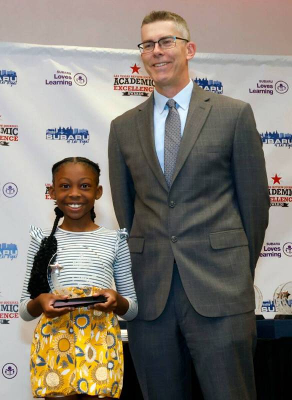 Jamari Jade Rhodes, second grader of Shelley Berkley Elementary School, poses for a photo with ...