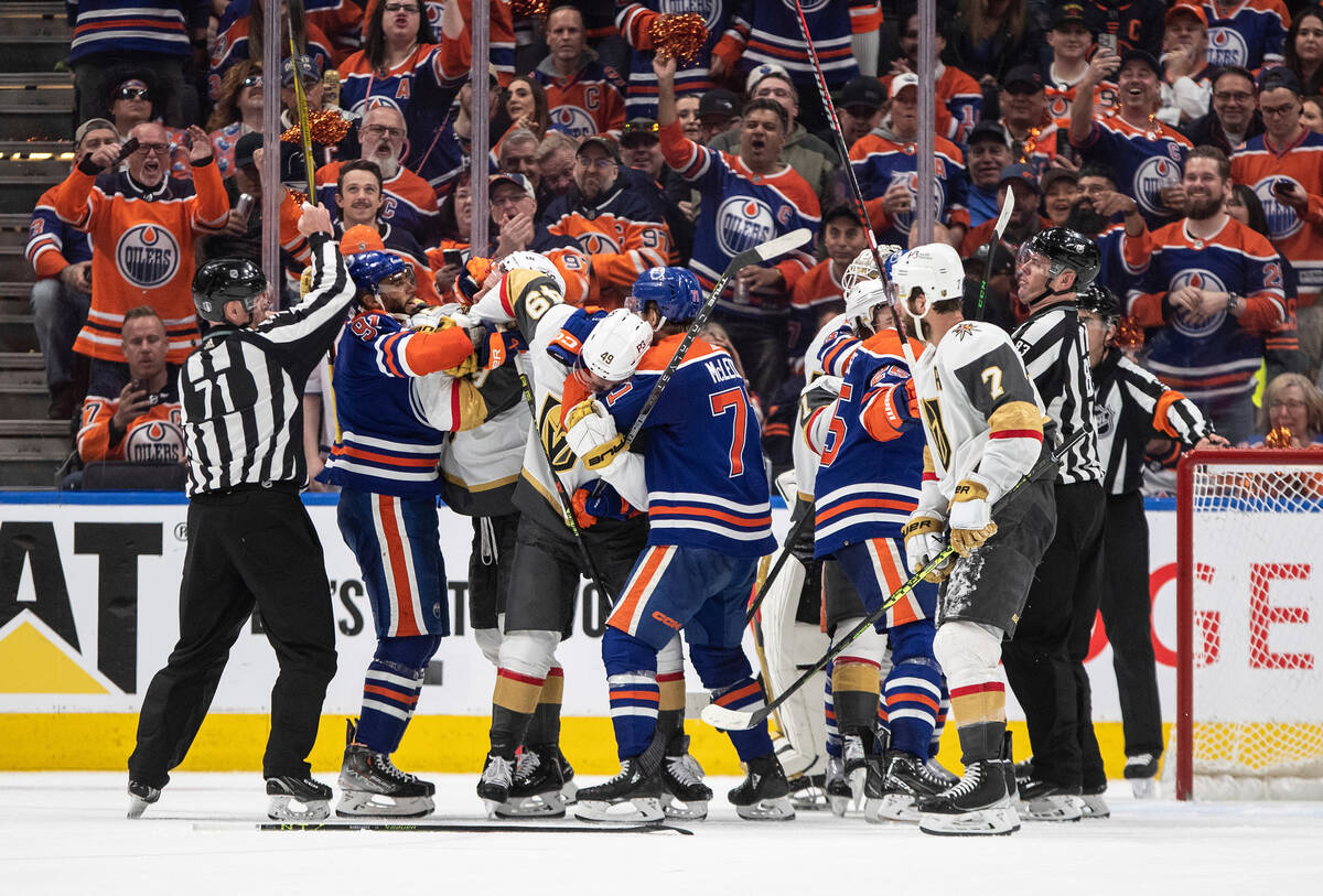 Vegas Golden Knights and Edmonton Oilers players rough it up during the third period of Game 4 ...