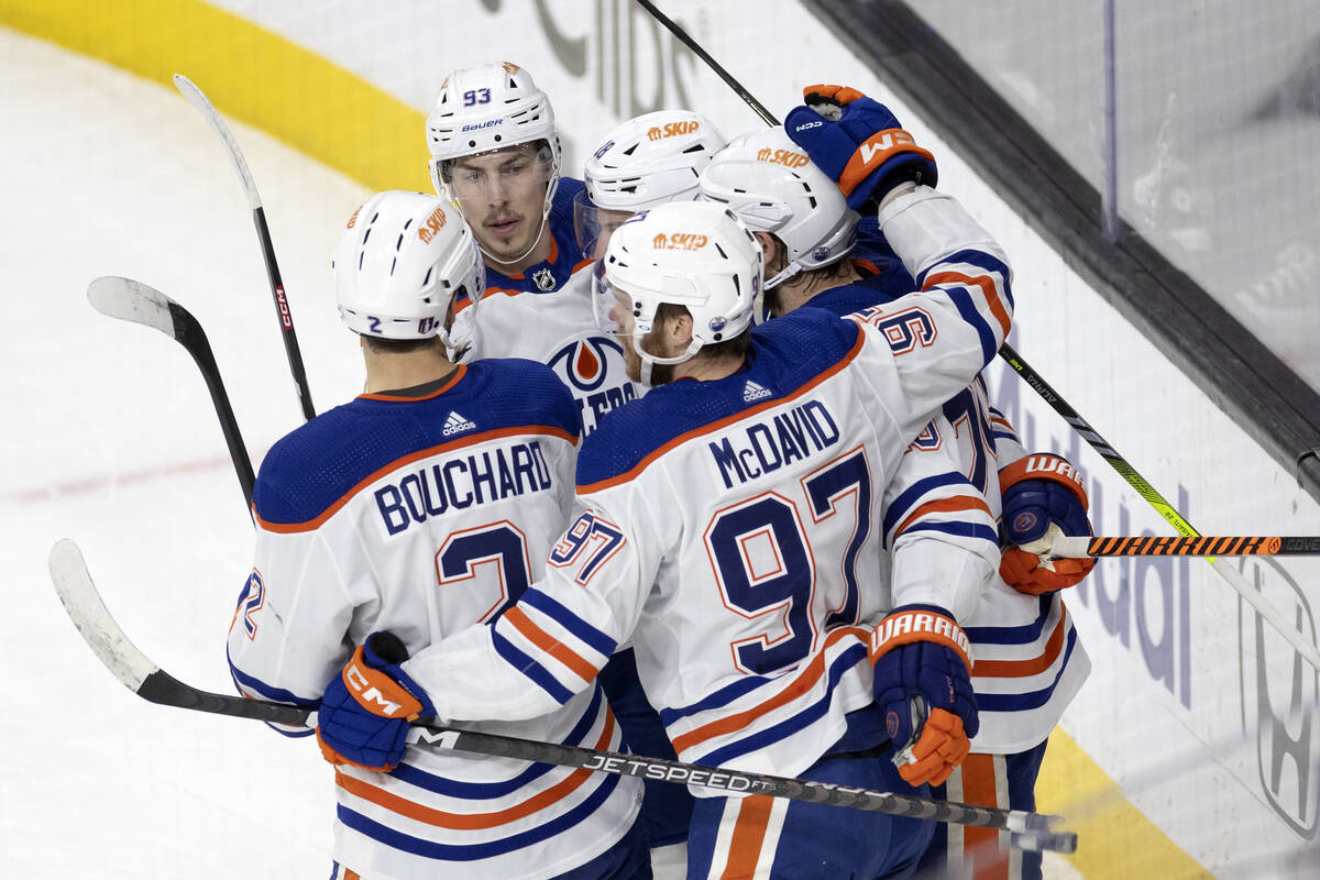 The Edmonton Oilers celebrate after left wing Zach Hyman (18) scored during the first period in ...