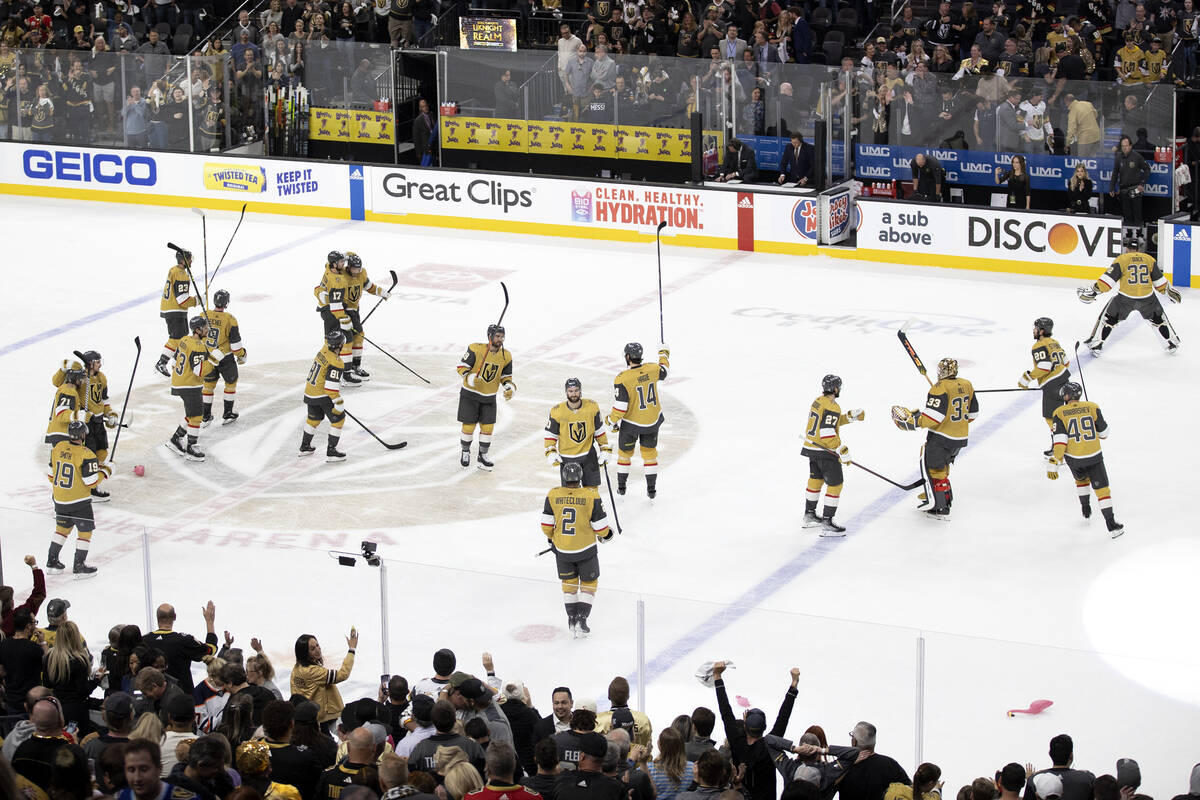 The Golden Knights gather on the ice after winning Game 5 of an NHL hockey Stanley Cup second-r ...