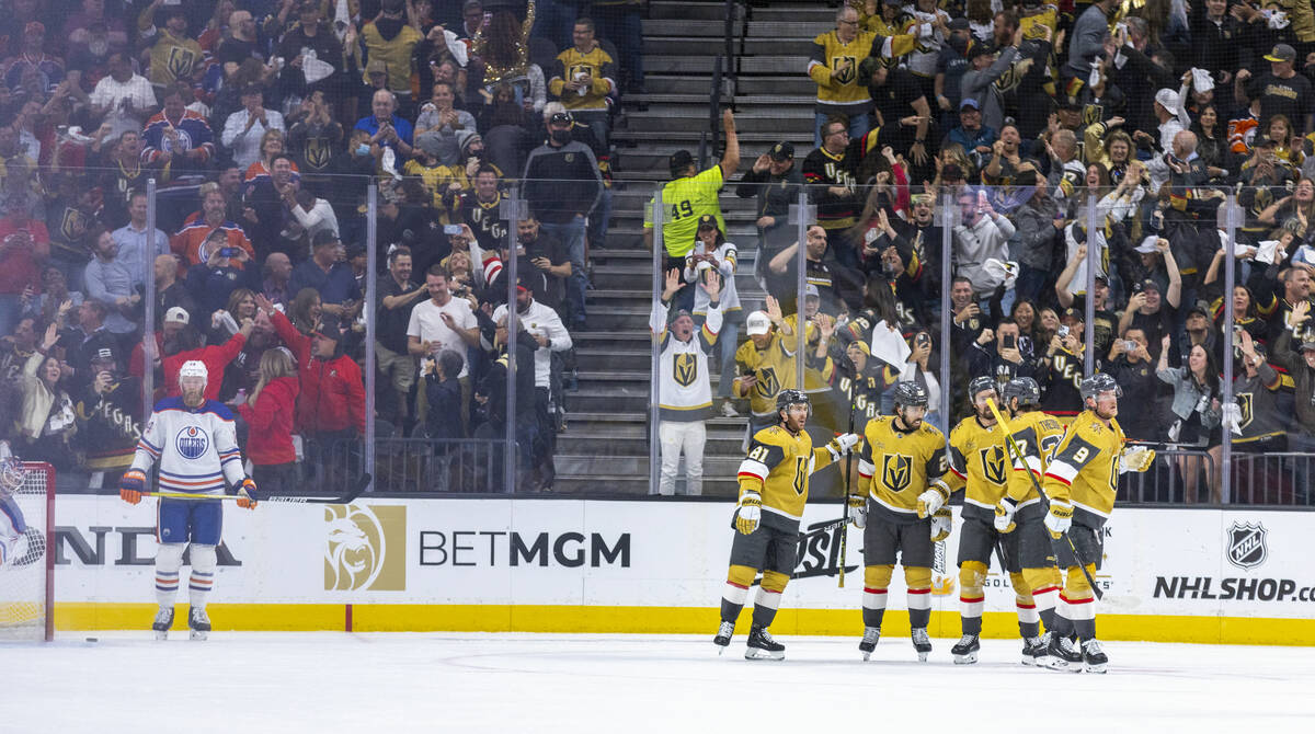 Golden Knights players celebrate a goal against the Edmonton Oilers during the second period i ...