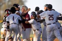 Desert Oasis celebrates after winning a high school Class 5A Southern Region playoff baseball g ...