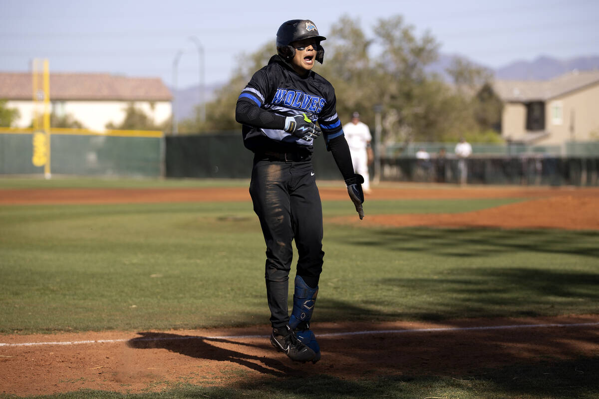 Basic’s Ty Southisene celebrates after hitting a home run during a high school Class 5A ...