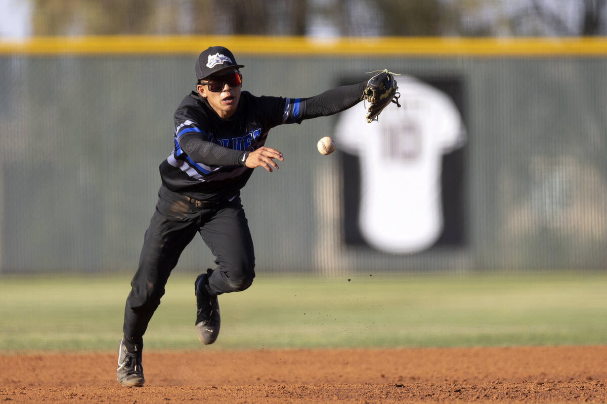Basic’s Ty Southisene fumbles a catch during a high school Class 5A Southern Region play ...