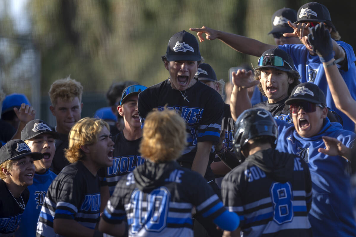 Basic celebrates after their Tate Southisene (8) scored during a high school Class 5A Southern ...