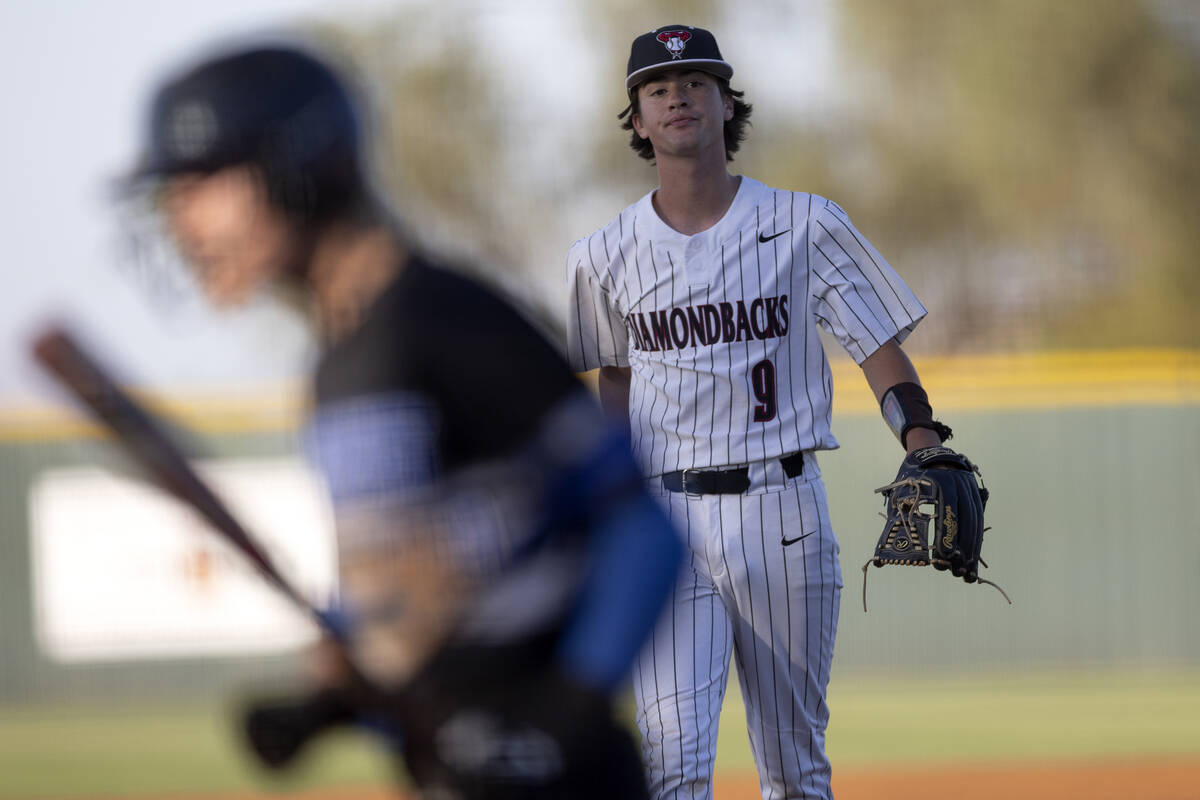 Desert Oasis pitcher Seth Graham-Pippin (9) reacts after striking out Basic’s Randall Ri ...