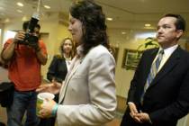 Heather Catherine Tallchief, center, speaks to members of the press before turning herself in t ...