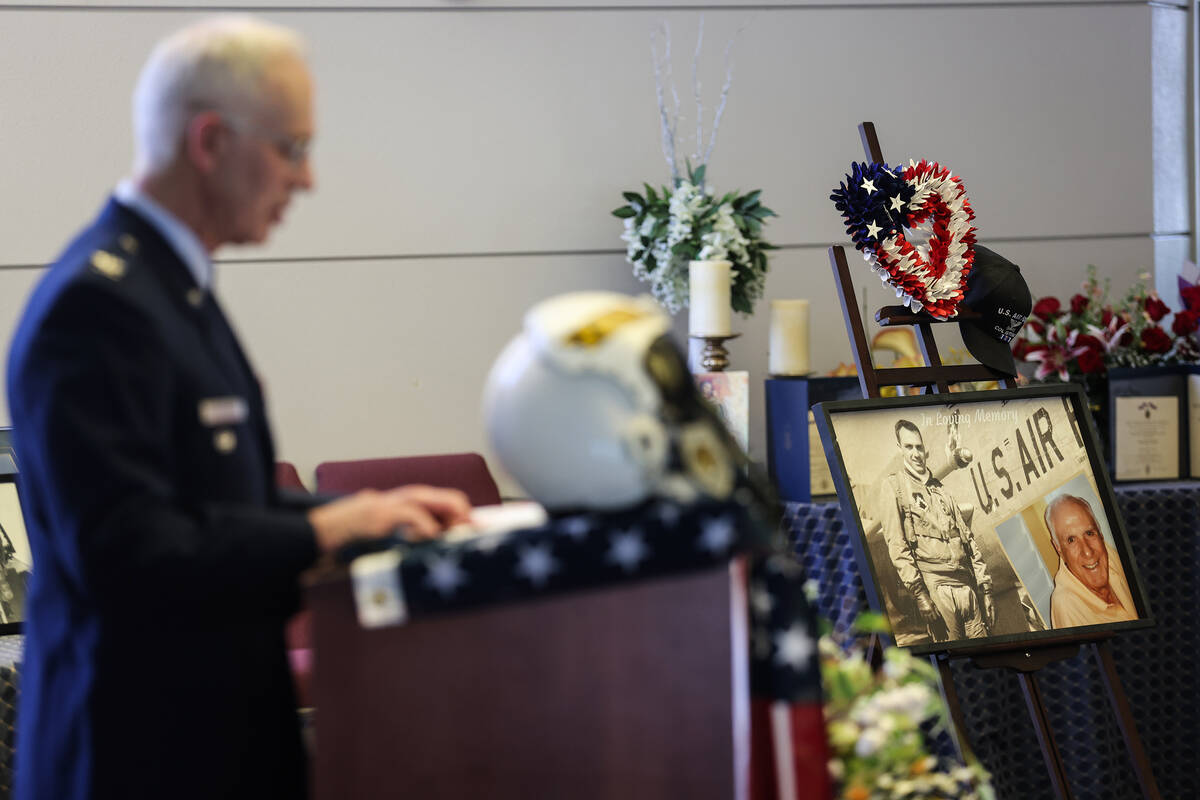 Retired Air Force member Bruce Fischer speaks about the life of Air Force Col. James Abraham at ...
