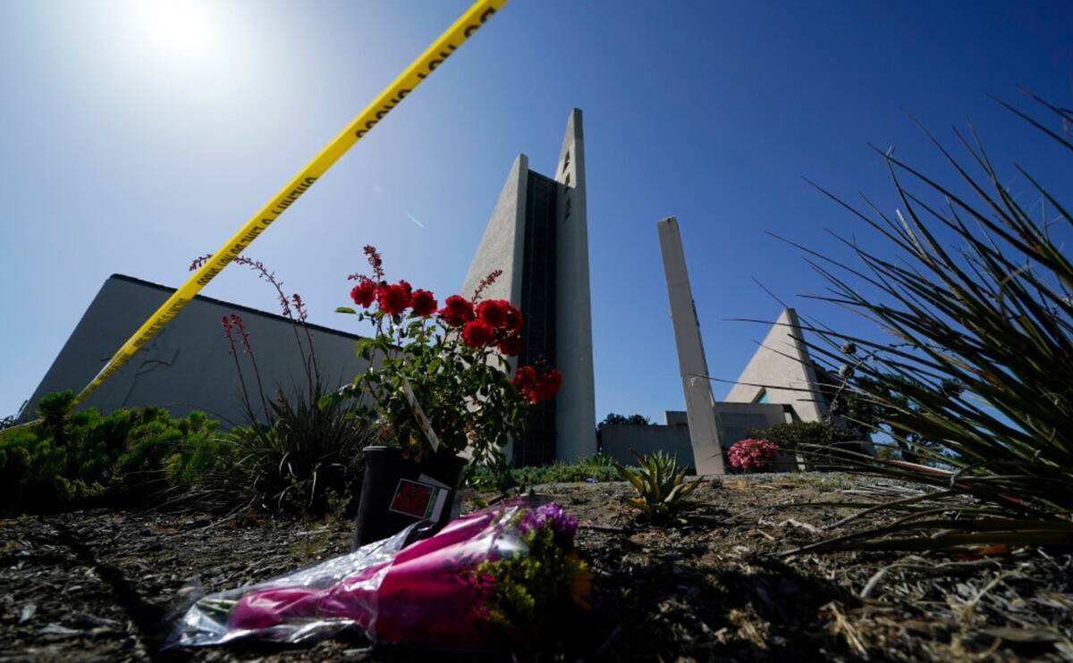 Flowers sit near Irvine Taiwanese Presbyterian Church in May 2022 in Laguna Woods, Calif., afte ...