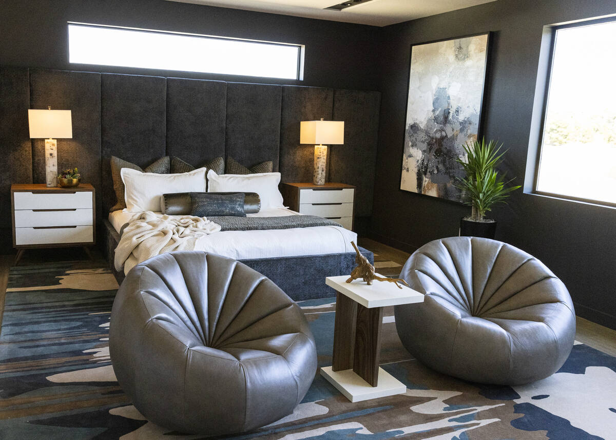 A master bedroom is seen in the newly finished house at the Oasi homes, built by Blue Heron Nex ...