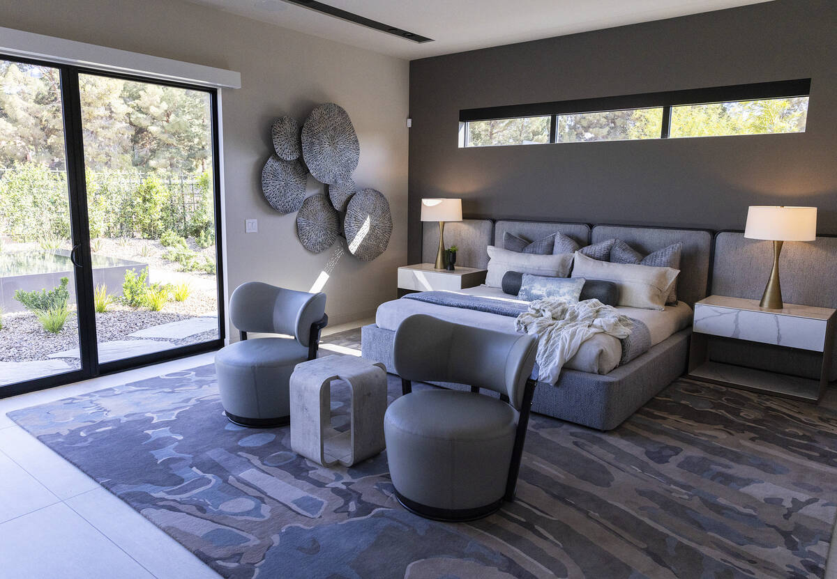 A master bedroom is seen in the newly finished house at the Oasi homes, built by Blue Heron Nex ...