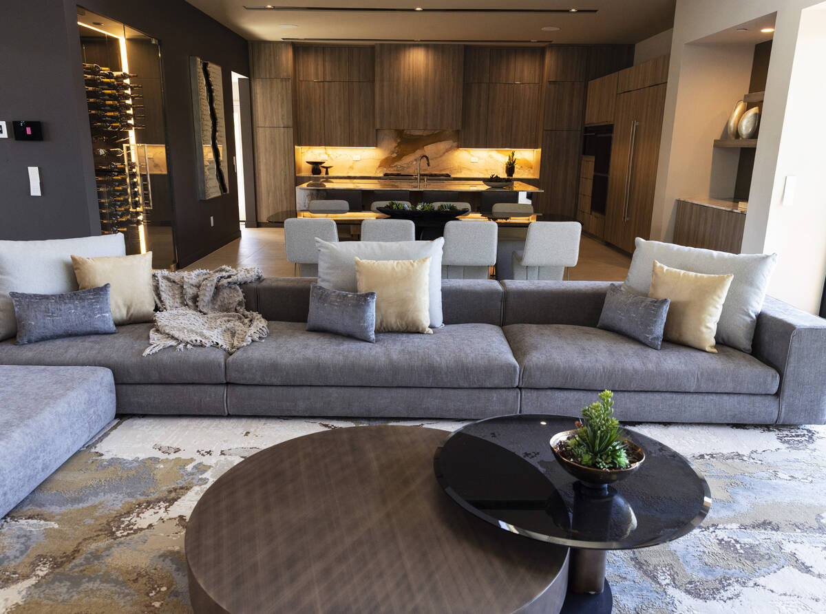 The living room and kitchen are seen in the newly finished house at the Oasi homes, built by Bl ...