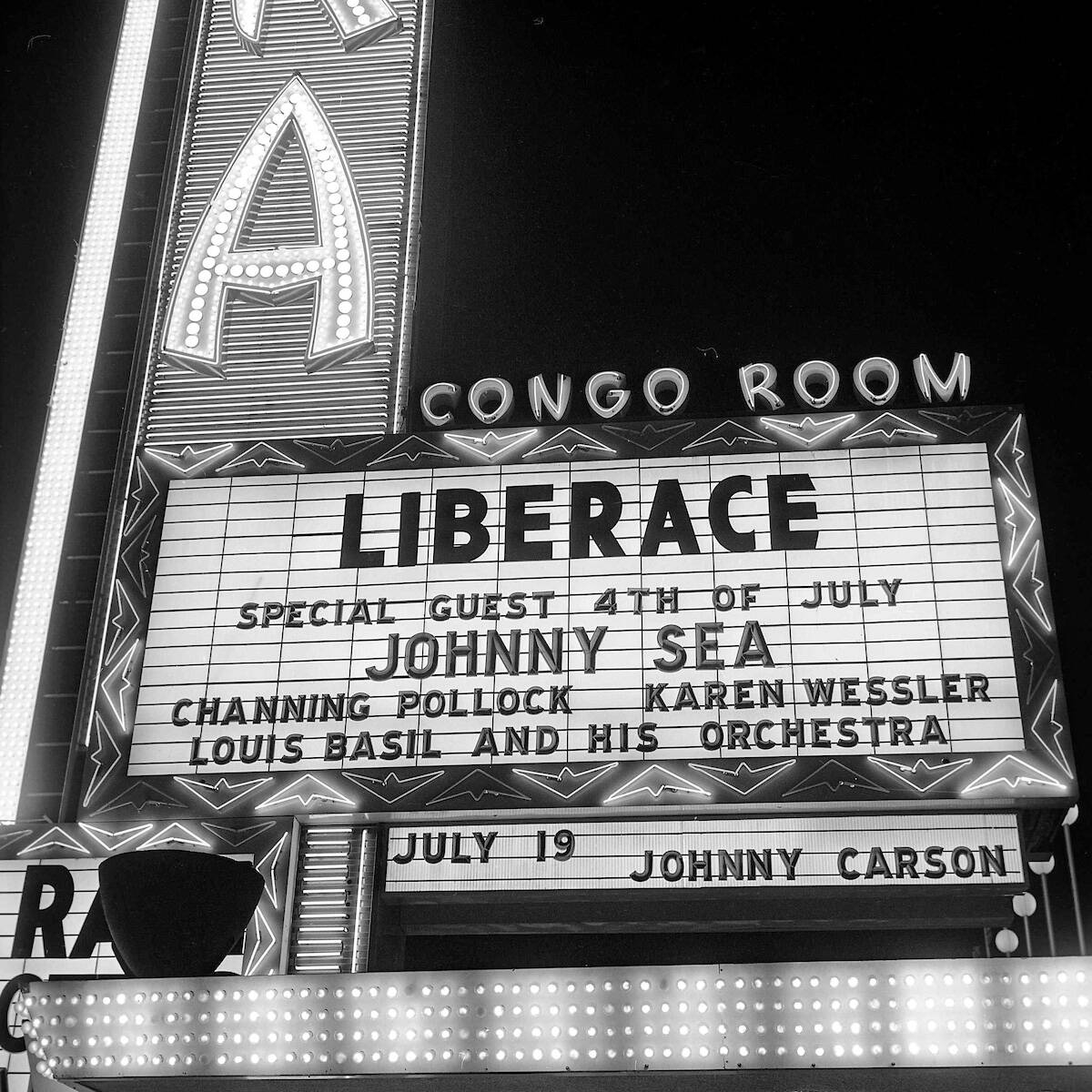 Liberace presenting Johnny Sea with Gold Record on Stage at the Sahara Hotel on July 4, 1966. O ...