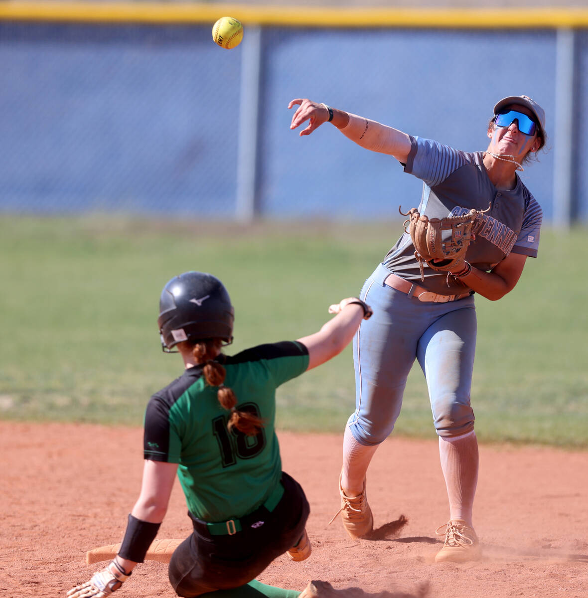 Centennial second baseman Juliana Bosco (2) throws to first after getting out Palo Verde&#x2019 ...