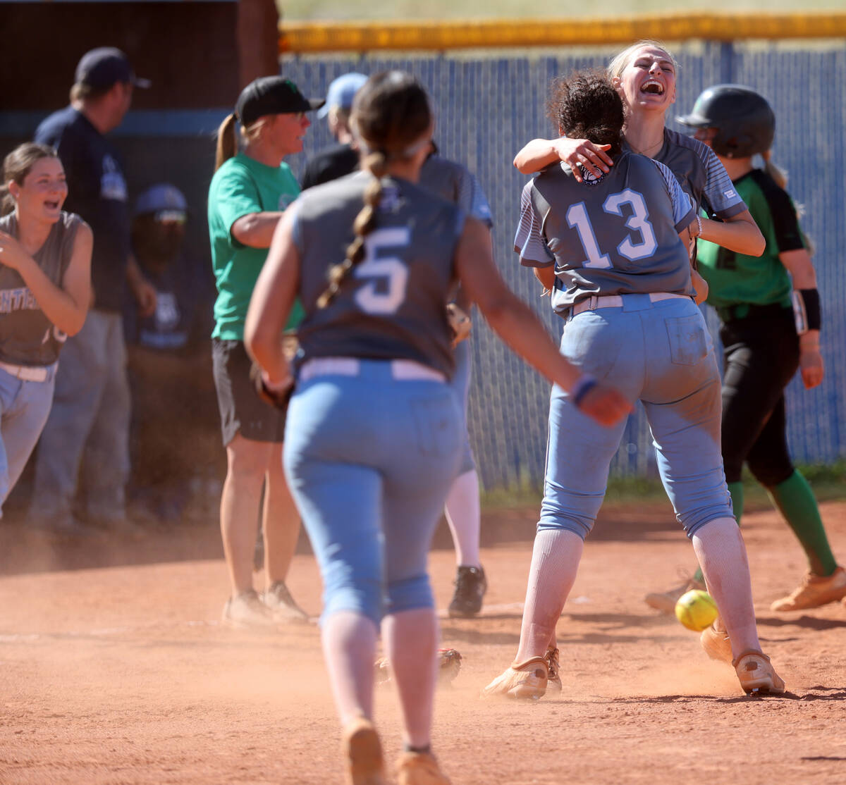 Centennial players, including pitcher Teagan Clemmons, right, celebrate beating Palo Verde 11-7 ...