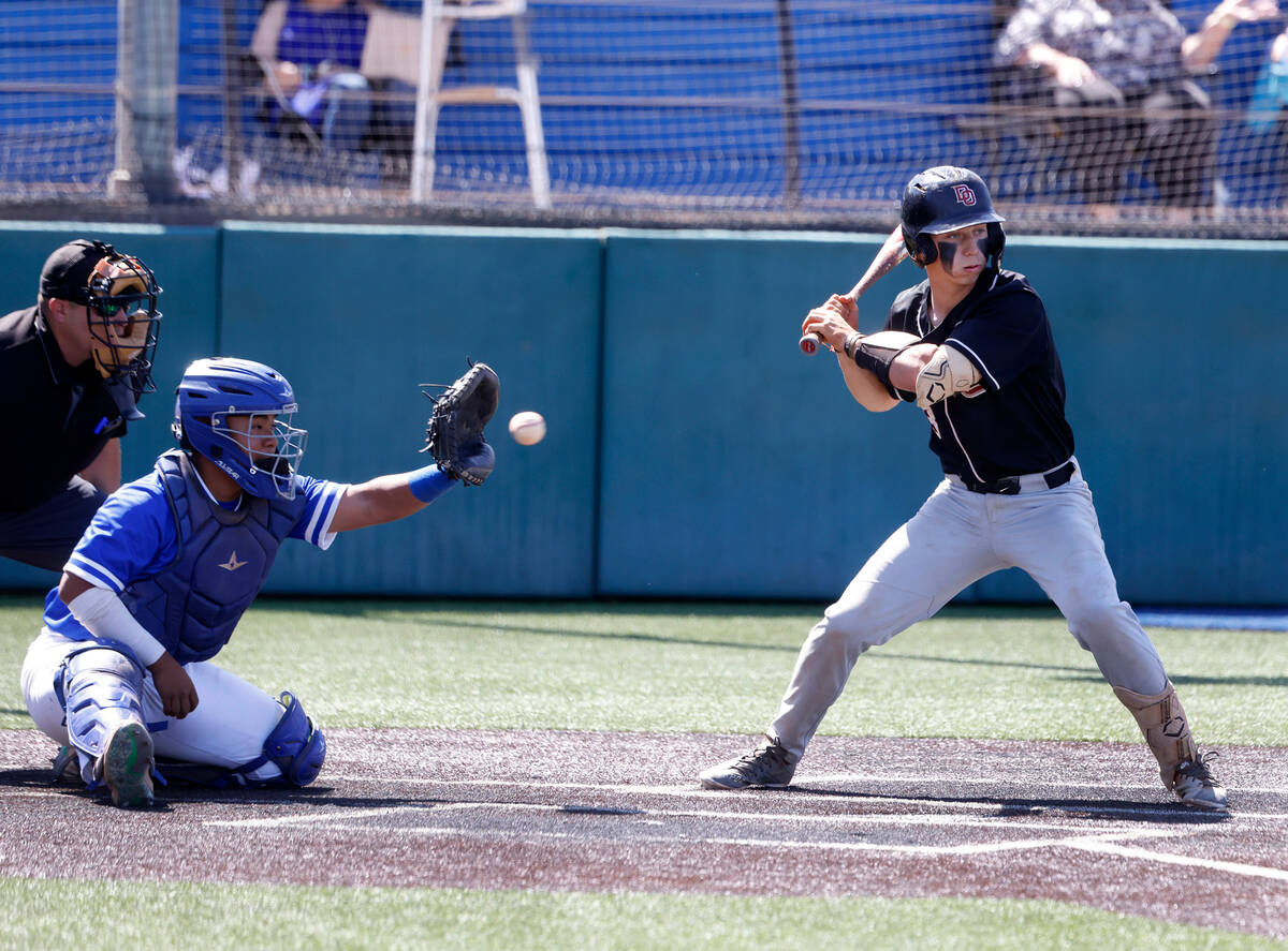 Desert Oasis High's Jake Cook (3) struck out looking by Bishop Gorman High's pitcher McKay Rowa ...