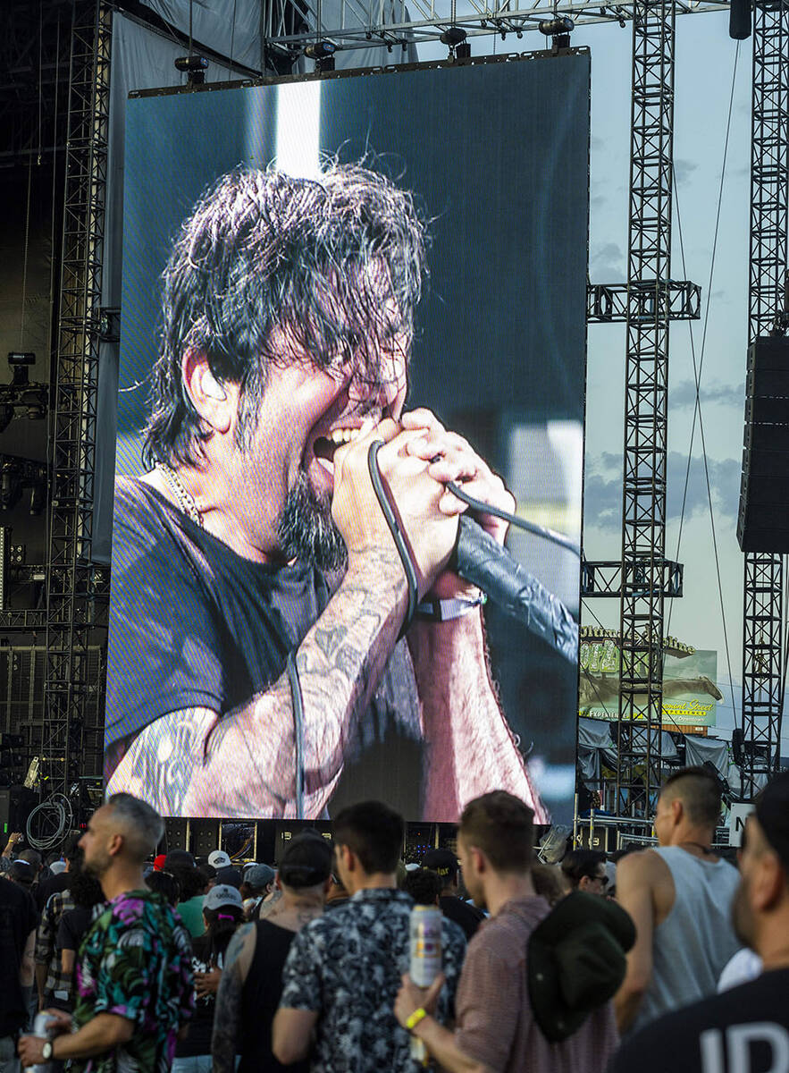 Deftones lead singer Chino Moreno performs with the band during the Sick New World festival at ...