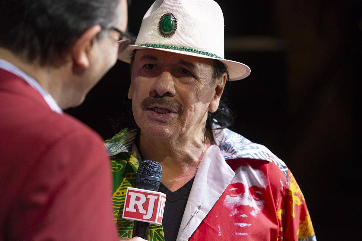 Carlos Santana talks to the Review-Journal's John Katsilometes during a press conference to ann ...