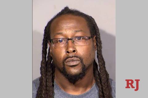 Donnie "Keyz" Coleman, 39, allegedly had an AR-15 and 9mm handgun attached to a "shooting platf ...