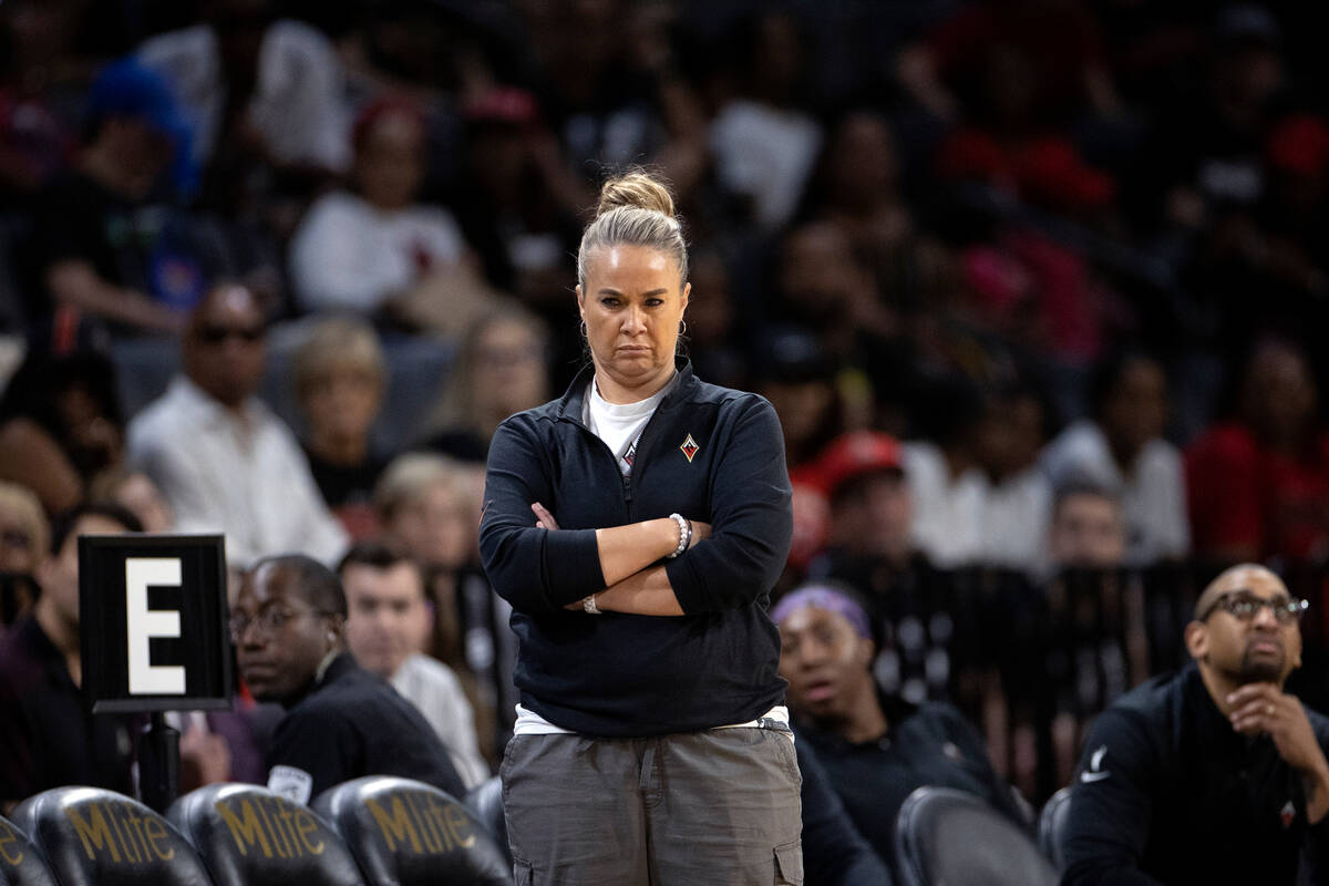 Las Vegas Aces head coach Becky Hammon watches her team play offense during the second half of ...