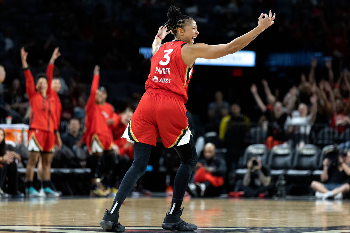 Aces forward Candace Parker (3) celebrates after scoring a three-pointer during the second half ...