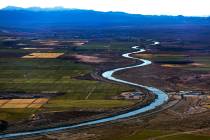 Bullhead City, Arizona, left, and Laughlin farm fields are seen along the Colorado River on Jan ...