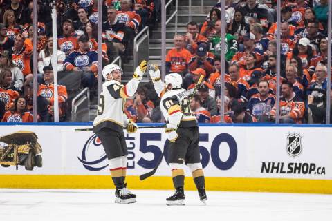 Golden Knights forwards Ivan Barbashev (49) and Jonathan Marchessault (81) celebrate Marchessau ...