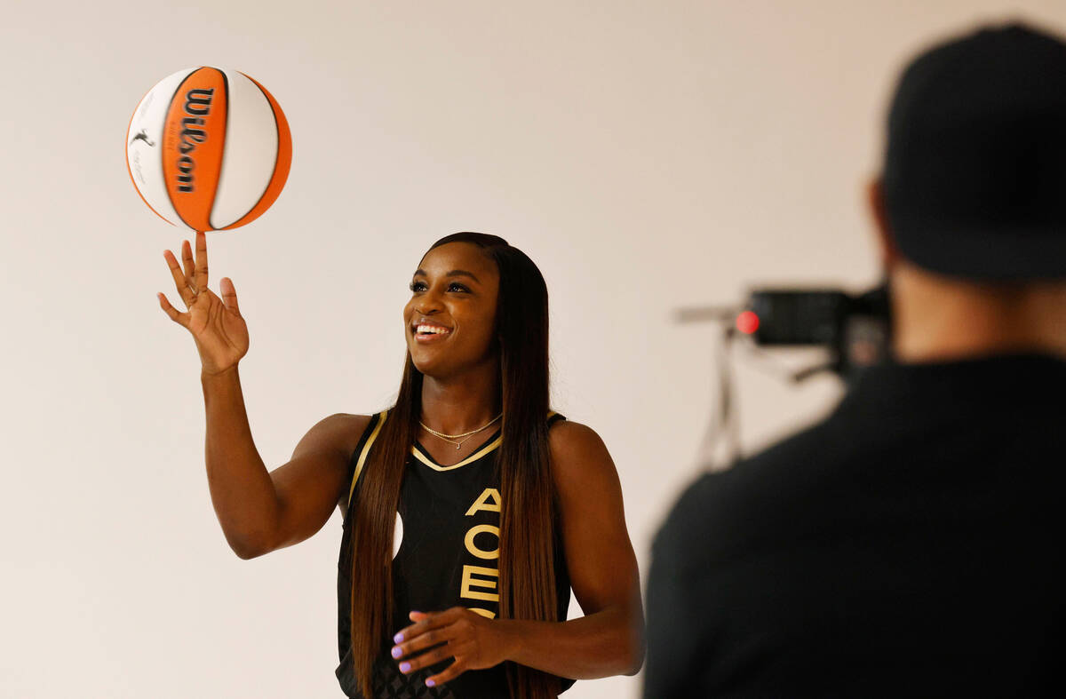 Las Vegas Aces guard Jackie Young poses for a photo during their media day, Monday, May 15, 202 ...