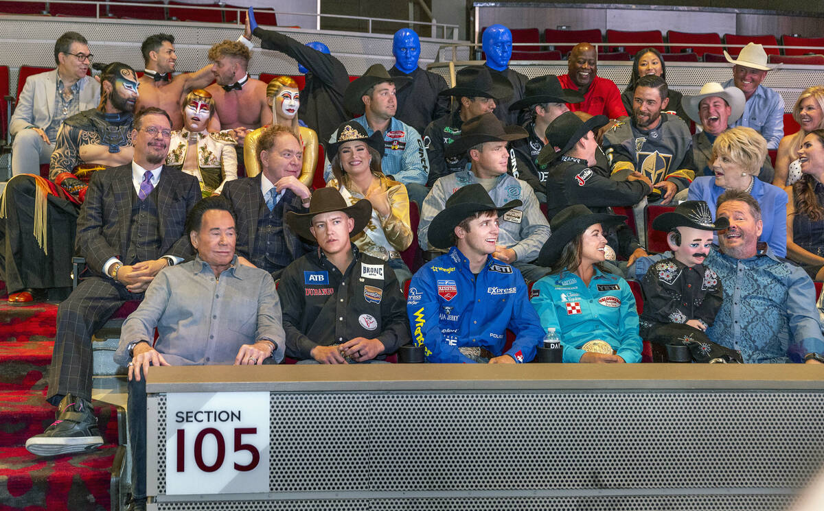 2022 NFR Champions gather to pose for a photo with Vegas icons and celebrities to celebrate the ...
